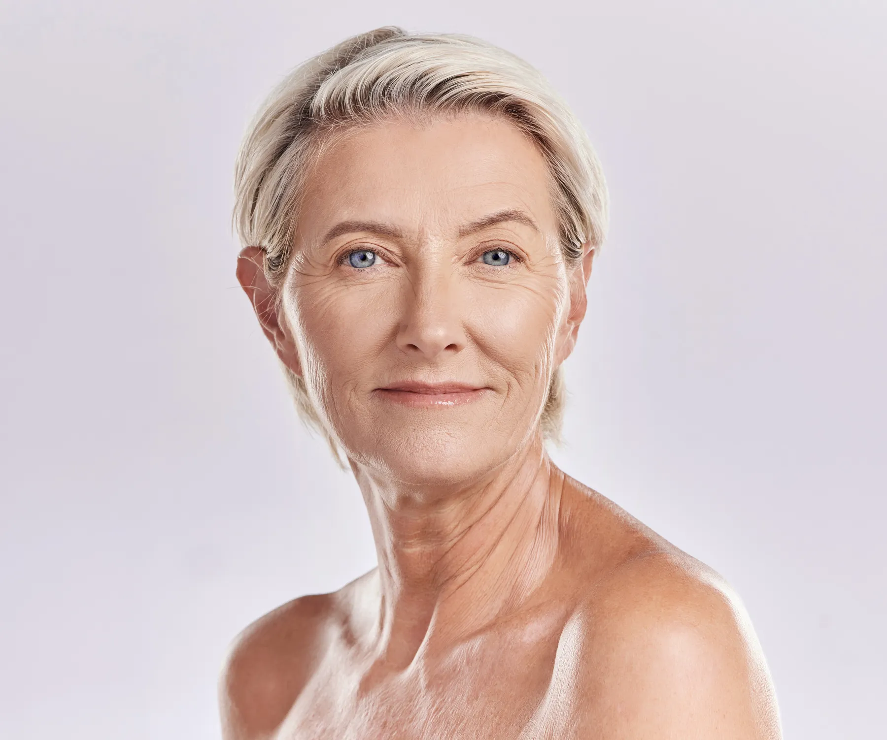 A beautiful senior woman portrait on white