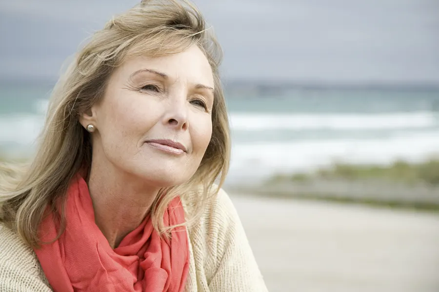 A woman enjoying ocean view at the beach